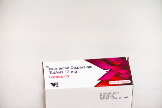 Ivermectin medication for COVID treatment on white background