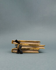 Three hardcover book on gray background. Learning in progress. Minimal book club concept. 
