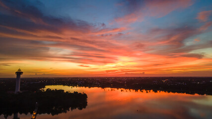 The evening sky was very colorful. and there is a capital city at night