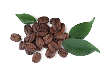 Fototapeta premium Pile of roasted coffee beans with fresh leaves on white background, top view