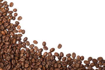 Many roasted coffee beans on white background, top view