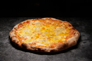 pizza with cheese and various ingredients