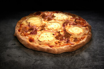 pizza with cheese and various ingredients