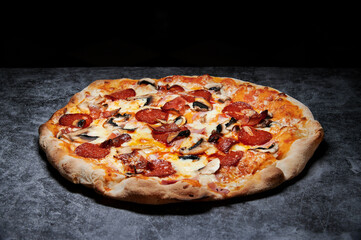 pizza with cheese and various ingredients