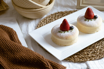 Delicious Japanese fluffy souffle pancakes on white cafe table. - 467194751