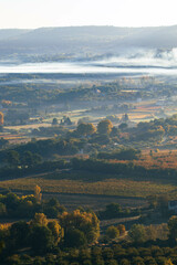 Fog over the mountains in autumn