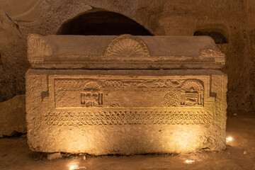 Sarcophagus with Ark of the Covenant carved relief in the Cave of the coffins at Bet She'arim in Kiryat Tivon, Israel catacombs with sarcophagi
