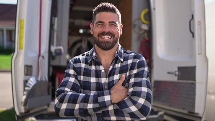Portrait of an electrician happy worker at work