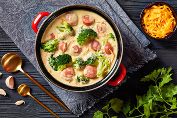 Broccoli Cheddar cheese Sausage Soup in a pot