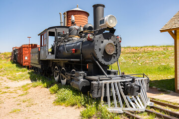 Fototapeta na wymiar Old Steam Railroad Locomotive