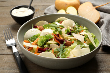 Delicious turnip salad served on wooden table