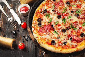 whole italian pizza in a pan, decorated