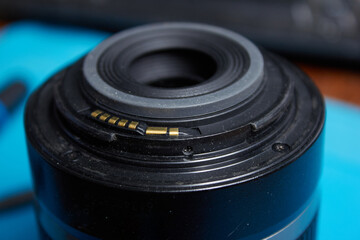 Photo lens with electrical contacts closeup shot