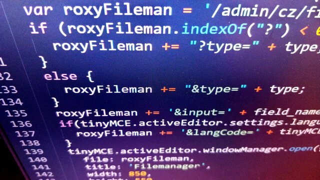 Prague, Czech Republic - June 18, 2021: JavaScript code shown on the monitor in a text highlighter program. The code is seen from top to bottom and it's part of an library.
