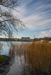View over the island Drottningholm, reeds in front of the castle a color full autumn day in Stockholm