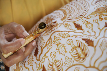 The process of making batik. Batik is a handmade traditional art from Indonesia. Produced by...