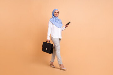 Full body photo of millennial arabic trend worker lady with bag telephone wear headscarf shirt...