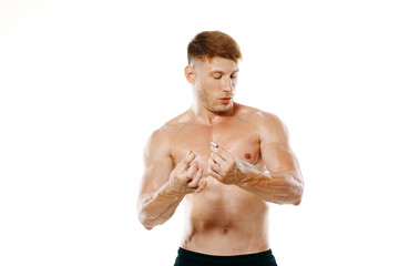 Fototapeta premium athletic man measures muscles fitness posing bodybuilder