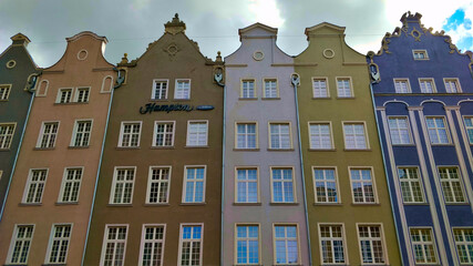 Fototapeta na wymiar Beautifully reconstructed traditional hanseatic city center houses with colorful facades.