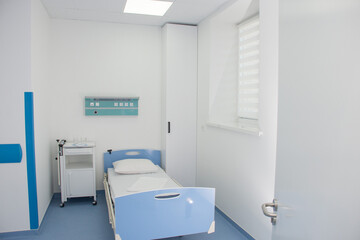 Empty modern hospital room with oxygen concentrator. Modern medical equipment in the intensive care unit