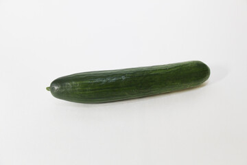 Smooth cucumber on an isolated background. Chinese variety of cucumbers.