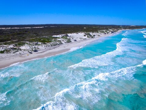 Aerial vie of ocean waves crashing on shore in Lancelin, Western Australia, Australia