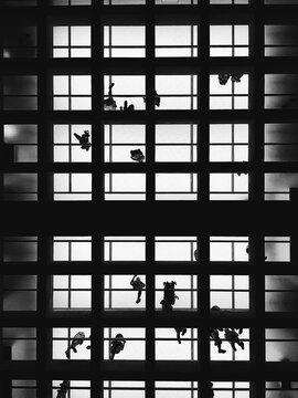 Interior view of modern building with see through ceiling in grayscale