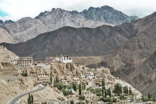Lamayuru Monastery on a hill near mountains in India