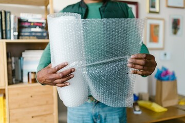 Person holding bubble wrap