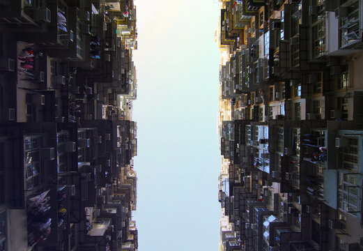 Worm view photo of two parallel and symmetric building