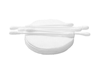 Cotton buds lie on the sponges, isolated on white background. Design abstract composition for beauty, medicine and cosmetics