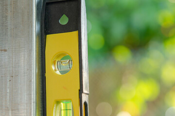 Spirit level or construction water level on steel pipe