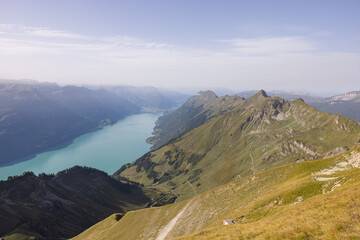 Amazing hiking day in the alps of Switzerland. Wonderful view over a beautiful lake called...