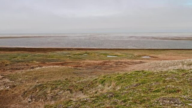 View of landswell of Yamal peninsula and Kara sea. Cloudy afternoon