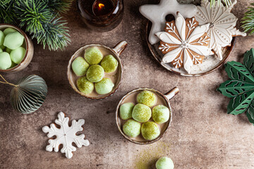 Cocoa with marshmallow and homemade gingerbread snowflakes.