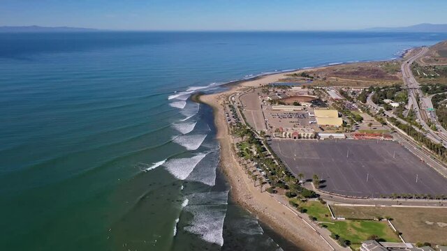2021 - Excellent aerial shot of waves lapping the shoreline by the Ventura fairgrounds in California.