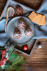 No bake chocolate Christmas pine cone sprinkled with powdered sugar