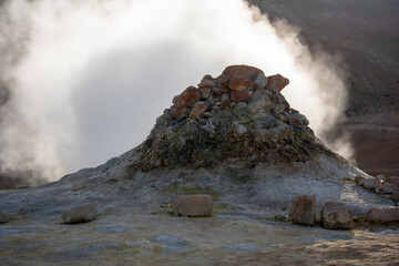 Landscape of steaming rocks at Mt. Námafjall Fumaroles boiling mud pit Diamond Circle Iceland