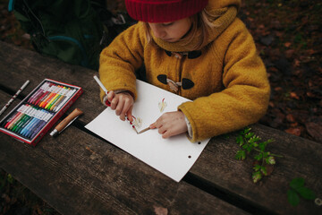 Little Child Drawing Outdoors