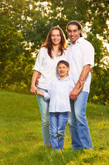 Fototapeta premium Image of an intarnational family in the park