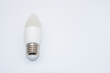 Elongated low power bulb on white background