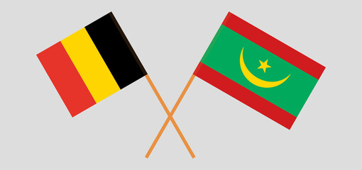 Crossed flags of Belgium and Mauritania. Official colors. Correct proportion