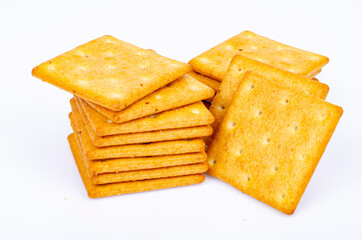 Delicious salty golden biscuit cracker square shape. Studio Photo.