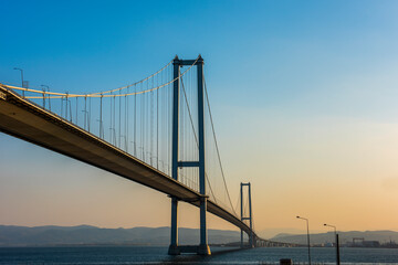Fototapeta na wymiar Osmangazi Bridge (Izmit Bay Bridge). IZMIT, KOCAELI, TURKEY. Longest bridge in Turkey and the fourth-longest suspension bridge in the world by the length of its central span.