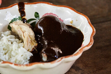 Documentary photography preparation of Oaxacan mole in Mexico, in a traditional way. Oaxacan tamales. Mexican food. Latin food. Spicy food.