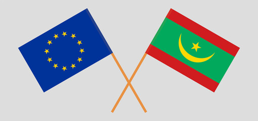 Crossed flags of the EU and Mauritania. Official colors. Correct proportion