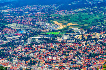 Fototapeta na wymiar Aerial view over city of Sarajevo during summer day.