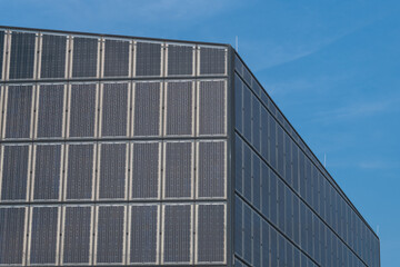 building facade covered with photovoltaic panels