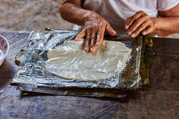 Documentary photography preparation of Oaxacan mole in Mexico, in a traditional way. Oaxacan tamales. Mexican food. Latin food. Spicy food.