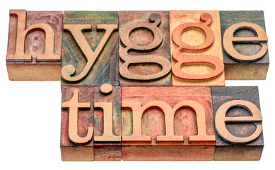 hygge time - isolated word abstract in vintage letterpress wood type blocks stained by colorful inks, Danish cozy lifestyle concept